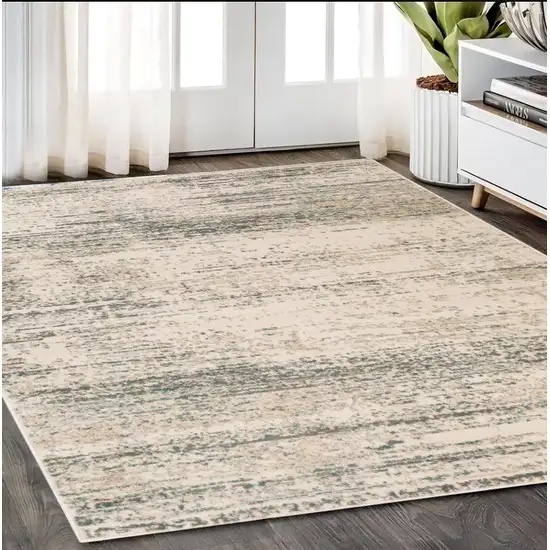 5' X 7' Ivory Striped Power Loom Area Rug Photo 1