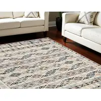 Photo of Ivory Tan And Black Geometric Flatweave Area Rug