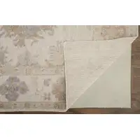 Photo of Ivory Tan And Blue Floral Hand Knotted Stain Resistant Area Rug