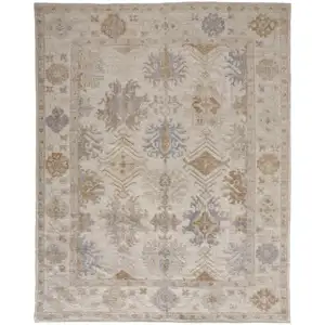 Photo of Ivory Tan And Blue Floral Hand Knotted Stain Resistant Area Rug