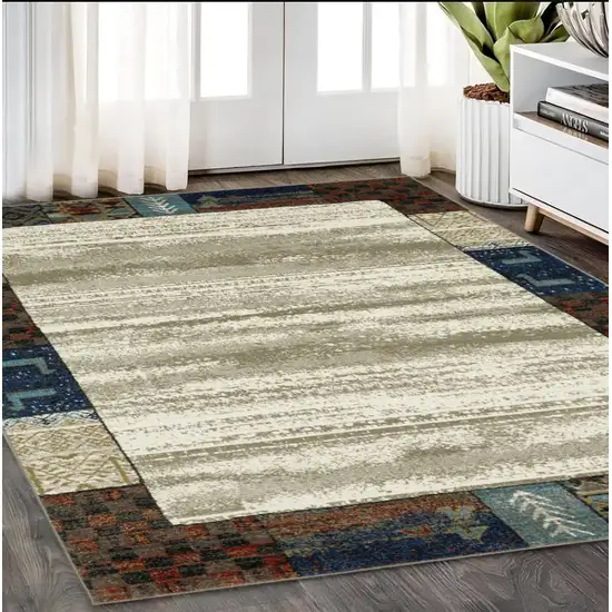 Ivory Tan And Blue Patchwork Area Rug Photo 1