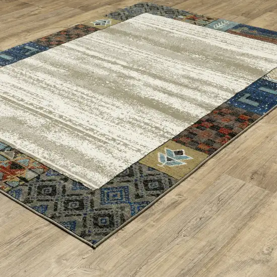 Ivory Tan And Blue Patchwork Area Rug Photo 4