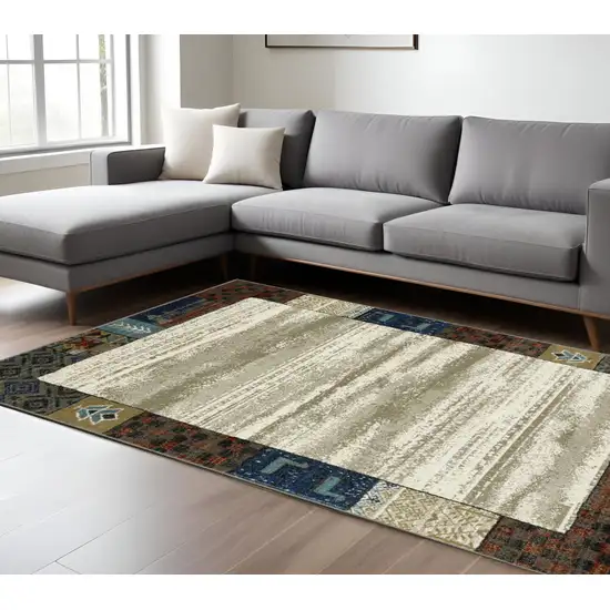 Ivory Tan And Blue Patchwork Area Rug Photo 1