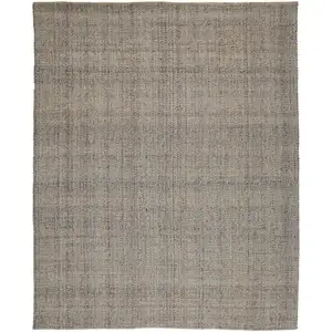 Photo of Ivory Tan And Gray Hand Woven Area Rug