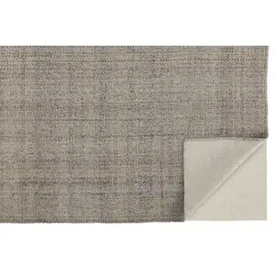 Photo of Ivory Tan And Gray Hand Woven Area Rug