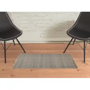 Photo of Ivory Tan And Gray Hand Woven Area Rug