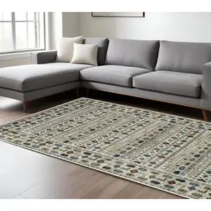 Photo of Ivory Tan And Gray Tribal Area Rug