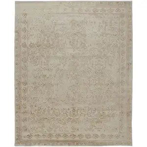 Photo of Ivory Tan And Pink Wool Floral Tufted Handmade Distressed Area Rug