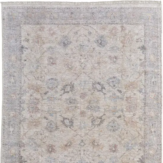 Ivory Tan and Blue Floral Hand Woven Distressed Area Rug With Fringe Photo 4