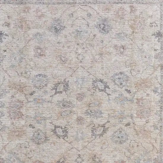 Ivory Tan and Blue Floral Hand Woven Distressed Area Rug With Fringe Photo 8