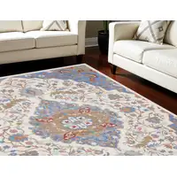 Photo of Ivory Tan and Blue Floral Medallion Non Skid Area Rug