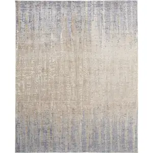 Photo of Ivory Tan and Blue Ombre Power Loom Worn Faded Area Rug