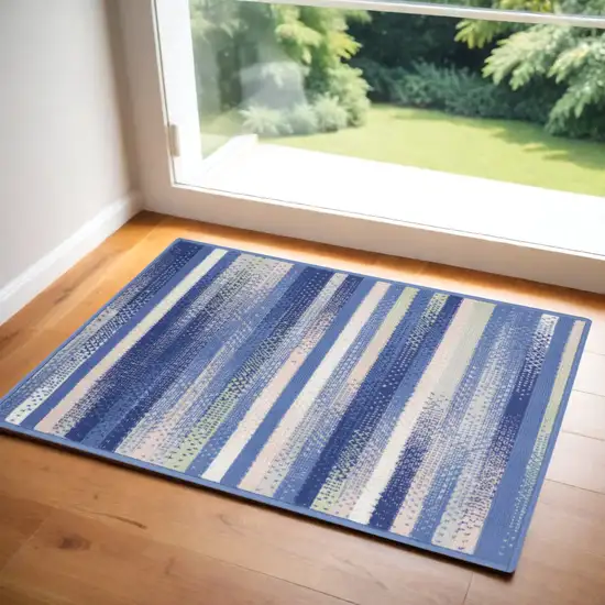 Ivory Tan and Blue Striped Area Rug Photo 1