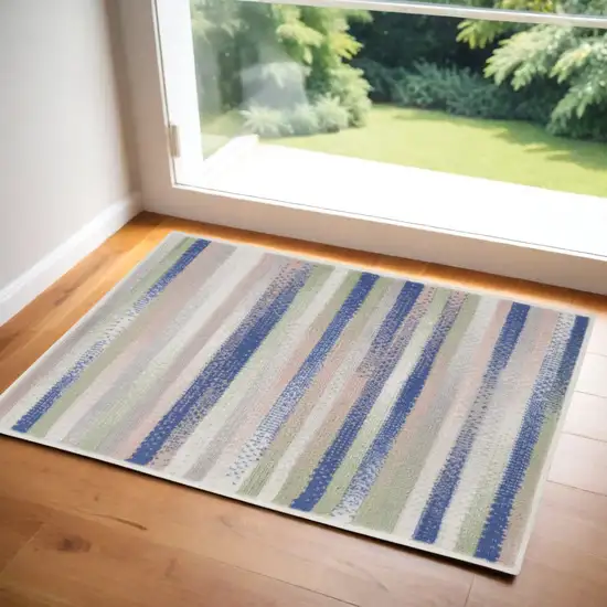 Ivory Tan and Blue Striped Area Rug Photo 1