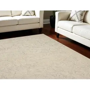 Photo of Ivory Tan and Gray Wool Geometric Area Rug