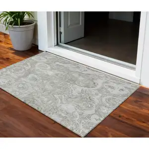 Photo of Ivory Taupe And Beige Abstract Washable Indoor Outdoor Area Rug