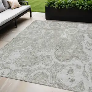 Photo of Ivory Taupe And Beige Abstract Washable Indoor Outdoor Area Rug