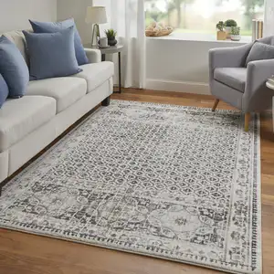 Photo of Ivory Taupe And Gray Abstract Stain Resistant Area Rug