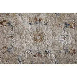 Photo of Ivory Taupe and Blue Abstract Power Loom Worn Faded Area Rug With Fringe