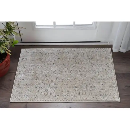 Ivory Taupe and Blue Abstract Power Loom Worn Faded Area Rug With Fringe Photo 1