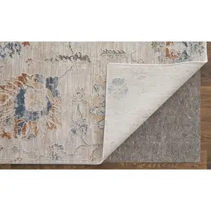 Photo of Ivory Taupe and Blue Floral Power Loom Worn Faded Area Rug With Fringe