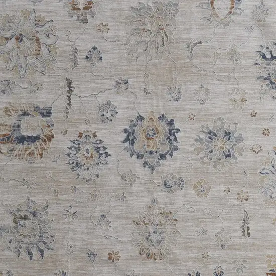 Ivory Taupe and Blue Floral Power Loom Worn Faded Area Rug With Fringe Photo 9