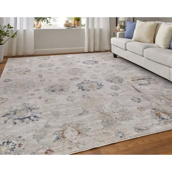 Ivory Taupe and Blue Floral Power Loom Worn Faded Area Rug With Fringe Photo 9