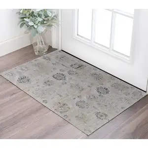 Photo of Ivory Taupe and Blue Floral Power Loom Worn Faded Area Rug With Fringe