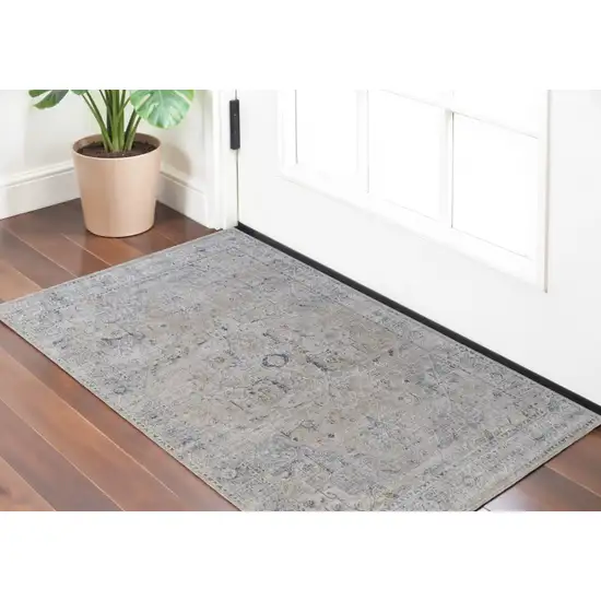 Ivory Taupe and Blue Oriental Power Loom Worn Faded Area Rug With Fringe Photo 1