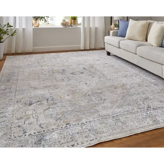 Ivory Taupe and Blue Oriental Power Loom Worn Faded Area Rug With Fringe Photo 9