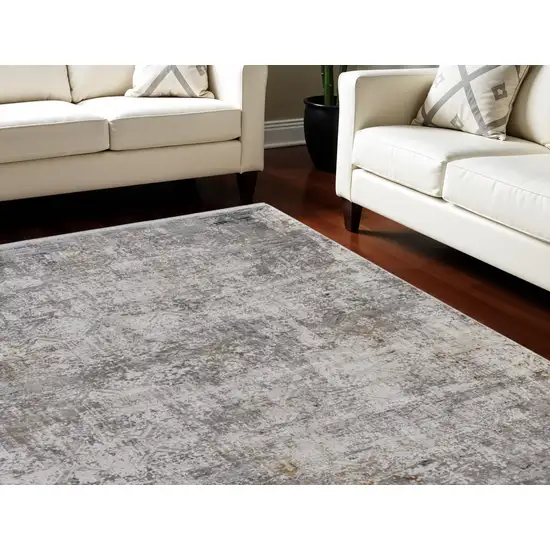 Ivory Taupe and Gray Abstract Power Loom Distressed Area Rug With Fringe Photo 1