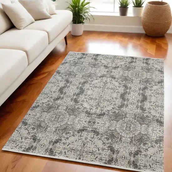 Ivory Taupe and Gray Abstract Power Loom Distressed Area Rug With Fringe Photo 1