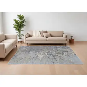 Photo of Ivory Taupe and Green Abstract Hand Tufted Worn Faded Area Rug