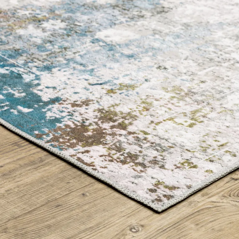 Ivory Teal Blue Grey Brown And Gold Abstract Printed Stain Resistant Non Skid Area Rug Photo 4