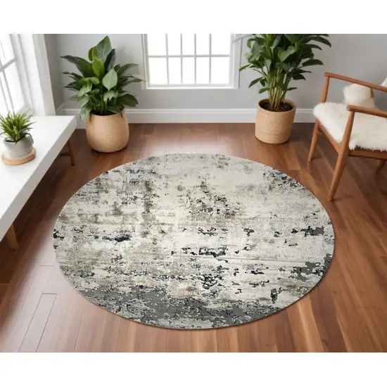 8' Ivory Teal Machine Woven Abstract Round Indoor Area Rug Photo 1