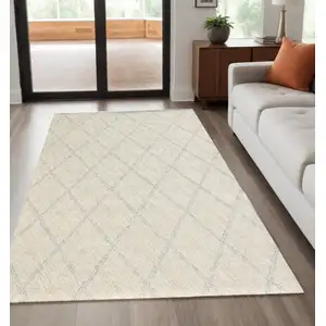 Photo of Ivory Wool Abstract Geometric Hand Tufted Non Skid Area Rug