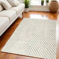 Photo of Ivory and Black Abstract Area Rug