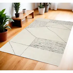 Photo of Ivory and Black Abstract Geometric Area Rug