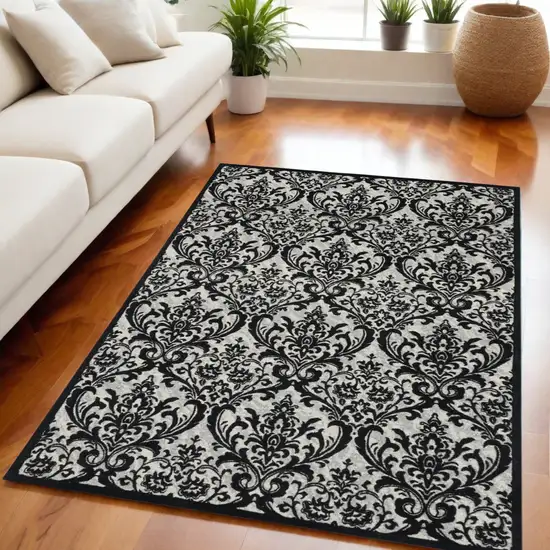 Ivory and Black Damask Distressed Area Rug Photo 1