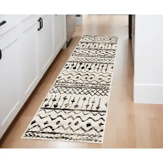 2' X 8' Ivory And Black Eclectic Patterns Indoor Runner Rug Photo 1