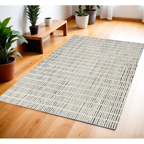 Ivory and Black Geometric Area Rug Photo 1