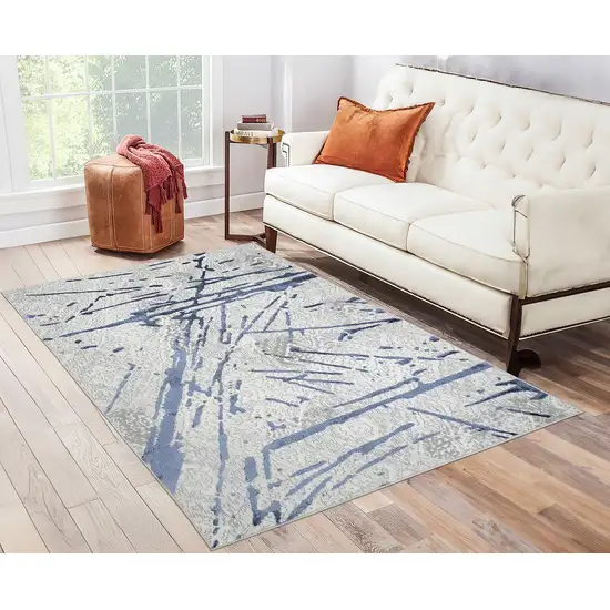 Ivory and Blue Abstract Area Rug Photo 7