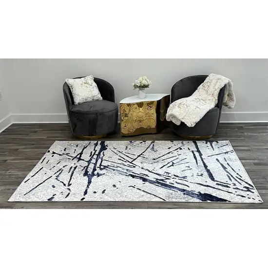 Ivory and Blue Abstract Area Rug Photo 5