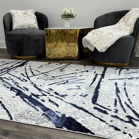 Ivory and Blue Abstract Area Rug Photo 7