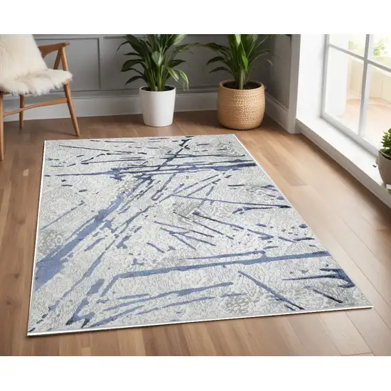 Ivory and Blue Abstract Area Rug Photo 2