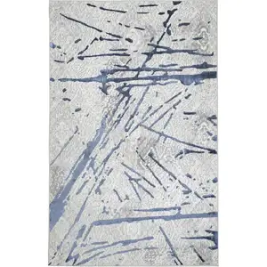 Photo of Ivory and Blue Abstract Area Rug