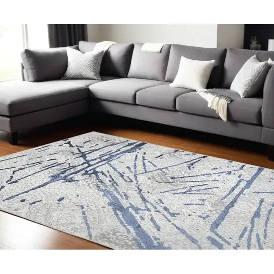 Ivory and Blue Abstract Area Rug Photo 2