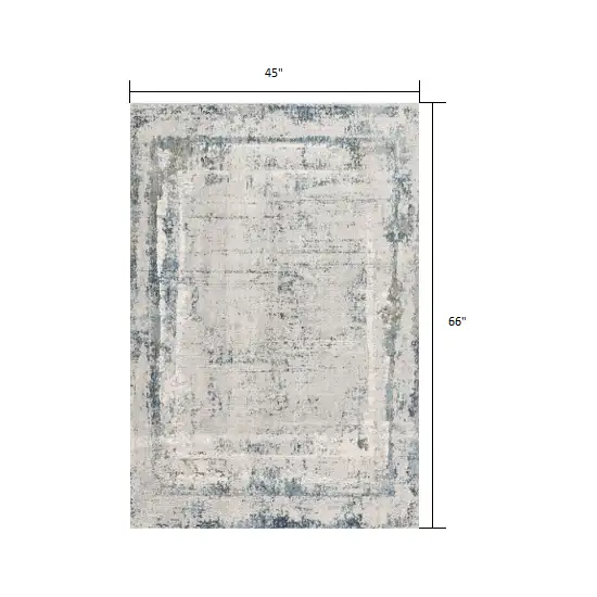 Ivory and Blue Abstract Distressed Area Rug Photo 2