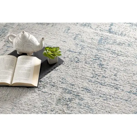 Ivory and Blue Abstract Distressed Area Rug Photo 8