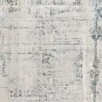 Photo of Ivory and Blue Abstract Distressed Area Rug
